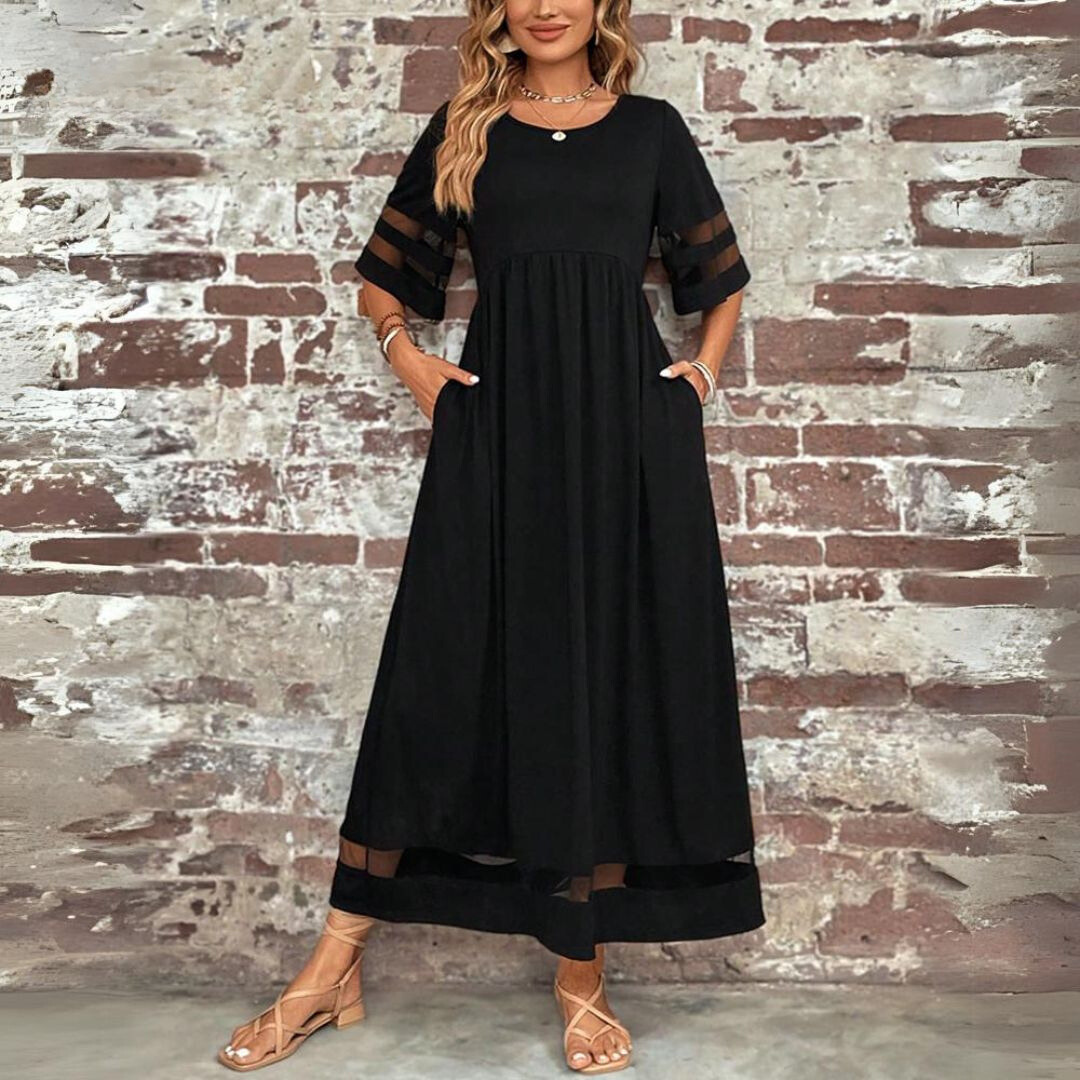 Black Aubrey Flattering Tummy-Smoothing Midi Dress by THE WHITMORE FAMILY, showcasing a stylish, fitted silhouette and elegant design.
