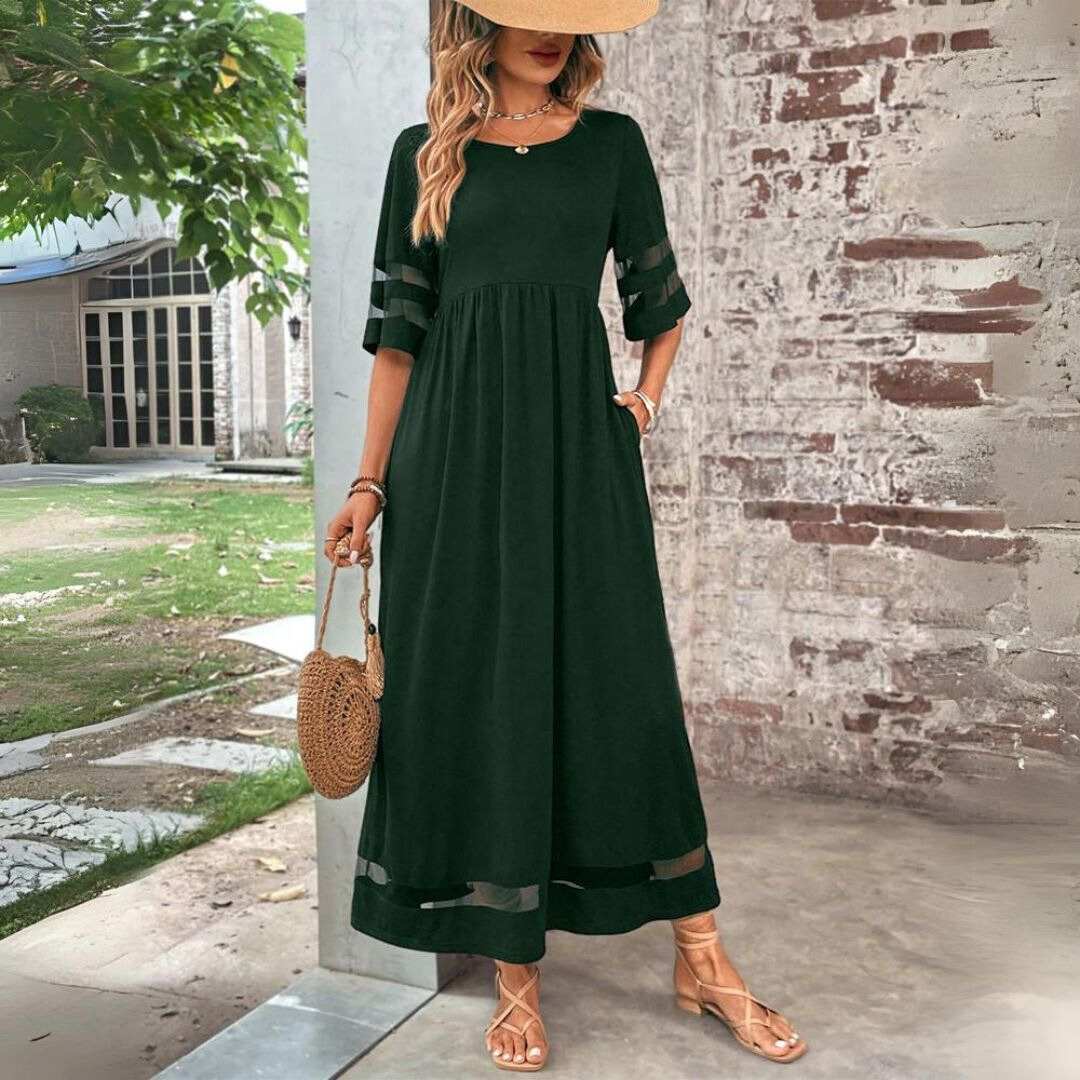 Black Aubrey midi dress by THE WHITMORE FAMILY, featuring a flattering fit and tummy-smoothing silhouette.
