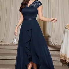 Blushing pink formal dress with elegant lace bodice and flowing chiffon skirt by THE WHITMORE FAMILY.