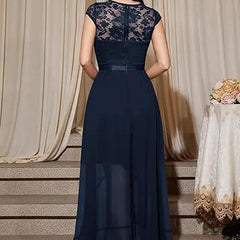 Blushing pink formal dress with elegant lace bodice and flowing chiffon skirt by THE WHITMORE FAMILY.