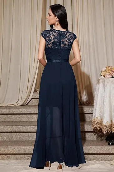 Blushing pink formal dress with elegant lace bodice and flowing chiffon skirt by THE WHITMORE FAMILY.