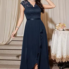 Blushing pink formal dress by THE WHITMORE FAMILY featuring an elegant lace bodice and flowing chiffon skirt.