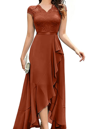 Blushing pink formal dress with elegant lace bodice and flowing chiffon skirt, designed by THE WHITMORE FAMILY.