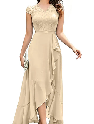 Blushing pink formal dress with elegant lace bodice and flowing chiffon skirt by THE WHITMORE FAMILY.