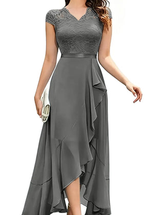 Blushing pink formal dress with elegant lace bodice and flowing chiffon skirt by THE WHITMORE FAMILY