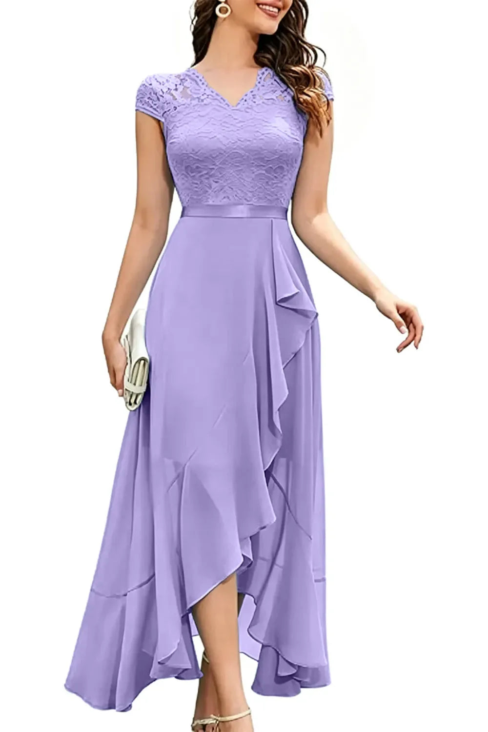 Blushing pink formal dress with elegant lace bodice and flowing chiffon skirt by THE WHITMORE FAMILY, suitable for special occasions.