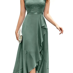 Blushing pink formal dress with elegant lace bodice and flowing chiffon skirt by THE WHITMORE FAMILY.