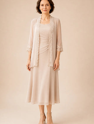 Mother of the bride champagne midi dress with lace jacket by THE WHITMORE FAMILY, elegant formal dress with lace detailing.