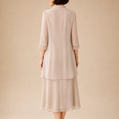 Mother of the Bride champagne midi dress with lace jacket by THE WHITMORE FAMILY, elegant formal gown with delicate lace details.