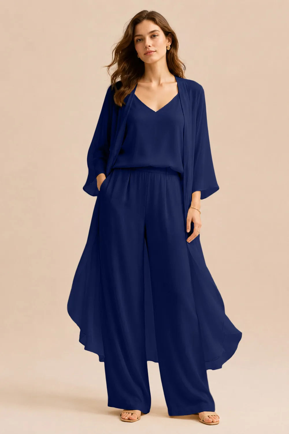 Refined camisole and chiffon jacket pant dress by THE WHITMORE FAMILY, champagne-colored ensemble with elegant fabric details.