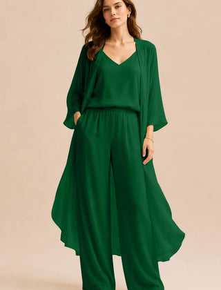 Elegant champagne-colored dress featuring a refined camisole and chiffon jacket with matching pants by THE WHITMORE FAMILY.