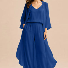 Elegant champagne-colored dress by THE WHITMORE FAMILY featuring a refined camisole, chiffon jacket, and matching pants.