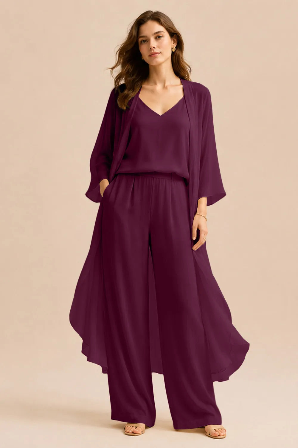 Refined camisole and chiffon jacket pant set dress by THE WHITMORE FAMILY, in champagne color, displayed on a dress form.