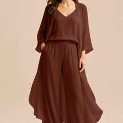 Elegant champagne dress set by THE WHITMORE FAMILY featuring a refined camisole, chiffon jacket, and matching pants.