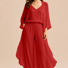 Elegant champagne dress by THE WHITMORE FAMILY featuring a refined camisole, chiffon jacket, and matching pants.