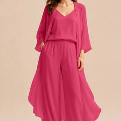 Elegant champagne dress featuring a refined camisole and chiffon jacket with matching pants from THE WHITMORE FAMILY.