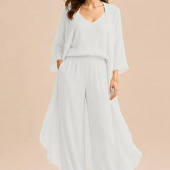 Elegant champagne dress by THE WHITMORE FAMILY featuring a refined camisole, chiffon jacket, and matching pants.