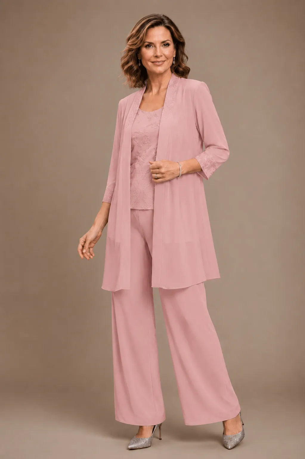 Evelyn embroidered three-piece pant set dress by THE WHITMORE FAMILY featuring colorful embroidery and a stylish design.