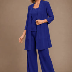 Evelyn embroidered three-piece pant set by THE WHITMORE FAMILY, featuring a stylish dress with intricate embroidery and matching pants.