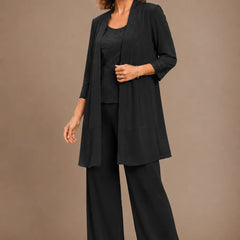 Evelyn embroidered three-piece pant set dress by THE WHITMORE FAMILY with colorful embroidery and matching top, pants, and tunic.