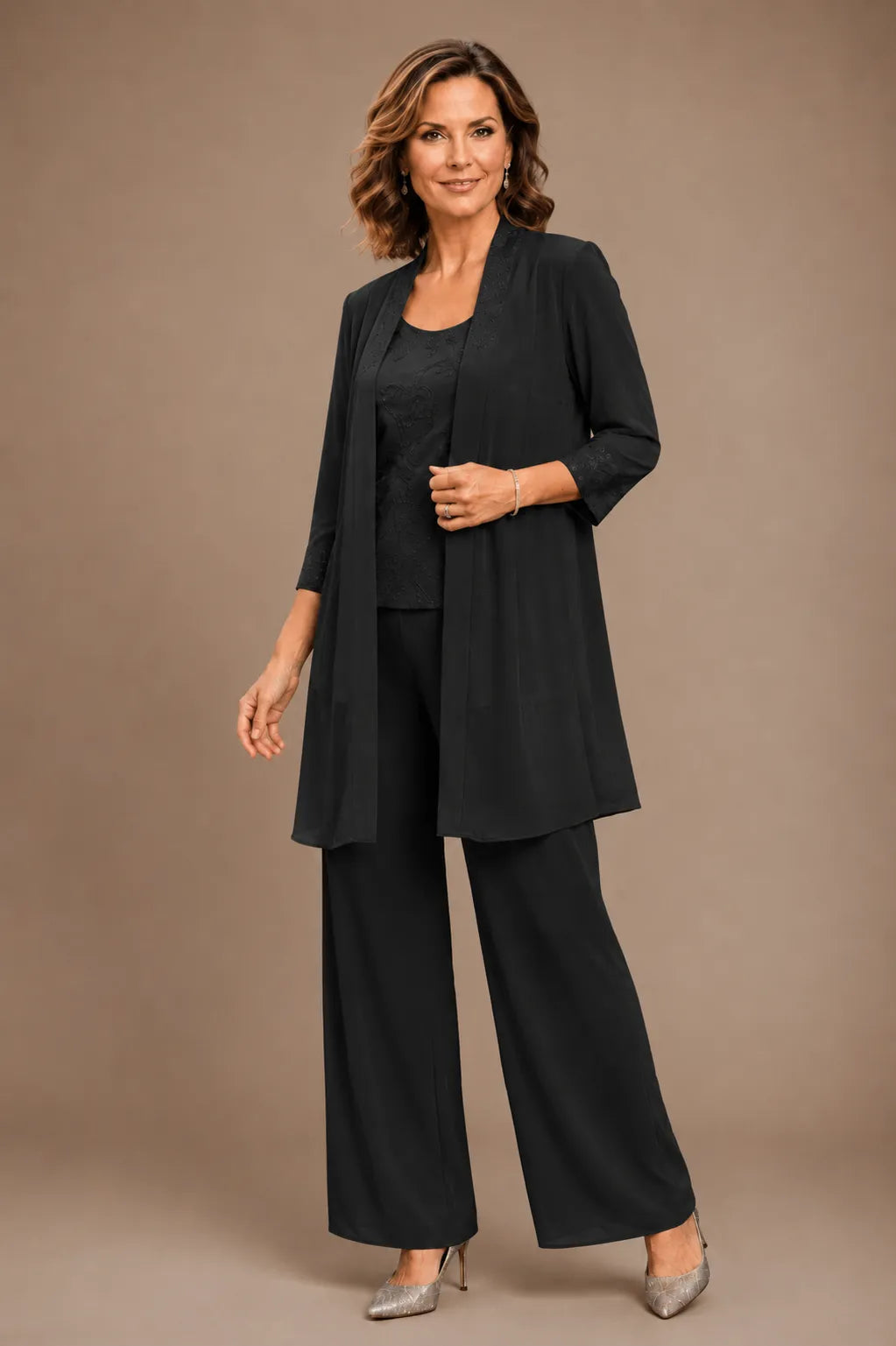 Evelyn embroidered three-piece pant set dress by THE WHITMORE FAMILY with colorful embroidery and matching top, pants, and tunic.
