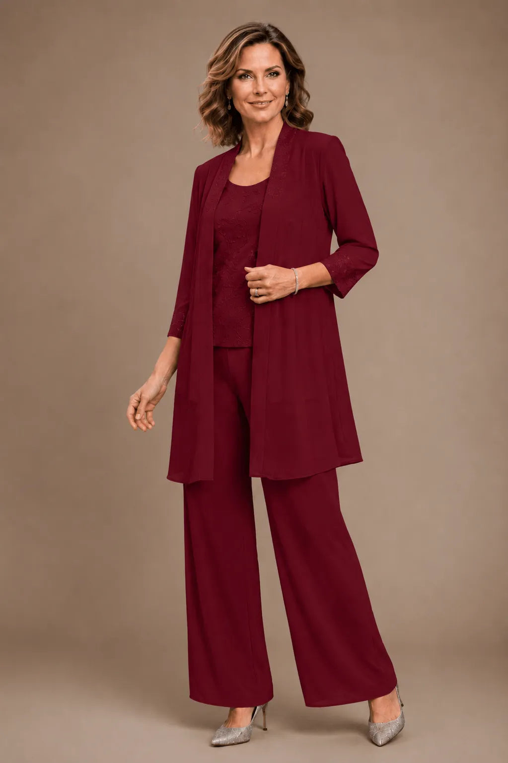 Evelyn embroidered three-piece pant set dress by THE WHITMORE FAMILY featuring colorful embroidery and relaxed fit.