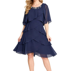 Dark navy Chic Tiered Chiffon Dress with sheer sleeves by THE WHITMORE FAMILY, featuring elegant layered fabric and delicate sleeve details.