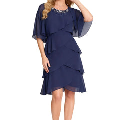 Dark navy Chic Tiered Chiffon Dress with sheer sleeves by THE WHITMORE FAMILY, featuring flowing layers and elegant detailing.