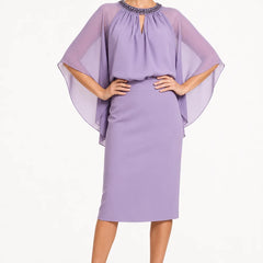 Dark navy elegant formal dress with cape sleeves by THE WHITMORE FAMILY, featuring a sophisticated and stylish design.