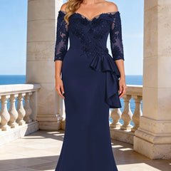 Dark navy elegant floor-length lace sleeve formal dress by THE WHITMORE FAMILY, showcasing a sophisticated and flowing design.