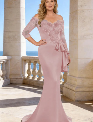 Dark navy elegant floor-length lace sleeve formal dress by THE WHITMORE FAMILY, showcasing intricate lace details and flowing silhouette.
