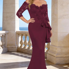 Dark navy elegant floor-length lace sleeve formal dress by THE WHITMORE FAMILY, showcasing intricate lace details and a flowing silhouette.