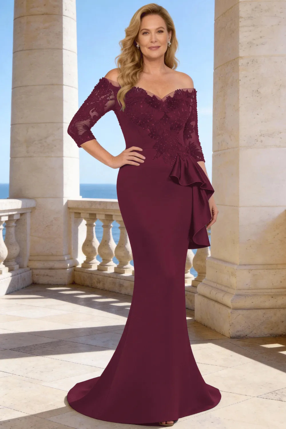 Dark navy elegant floor-length lace sleeve formal dress by THE WHITMORE FAMILY, showcasing intricate lace details and a flowing silhouette.