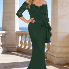 Dark navy elegant floor-length lace sleeve formal dress by THE WHITMORE FAMILY, showcasing intricate lace details and a flowing silhouette.