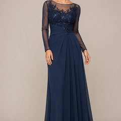 Sheer lace bodice A-line evening dress by THE WHITMORE FAMILY, with intricate lace details and flowing fabric for formal occasions.