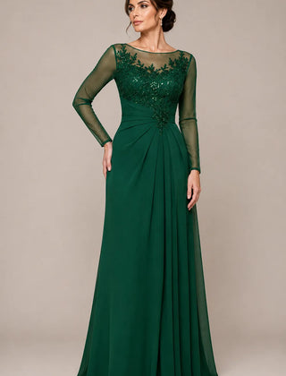Sheer lace bodice A-line evening dress by THE WHITMORE FAMILY, emerald green with elegant lace detailing and flowing skirt.