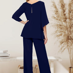 Elegant loose-fit formal pant dress set by THE WHITMORE FAMILY, featuring chiffon fabric and tailored design, shown from the back.