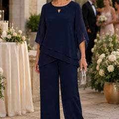 Sophisticated loose-fit formal pant dress set by THE WHITMORE FAMILY, featuring elegant tailored trousers and a matching top for women.