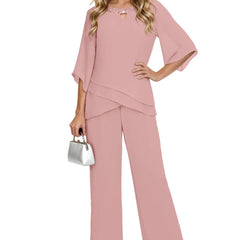 Pink loose-fit formal pant dress set by THE WHITMORE FAMILY featuring a chiffon fabric and elegant tailored design.