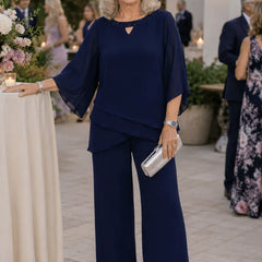 Sophisticated loose-fit formal pant dress set by THE WHITMORE FAMILY, featuring elegant design and tailored fit for special occasions.