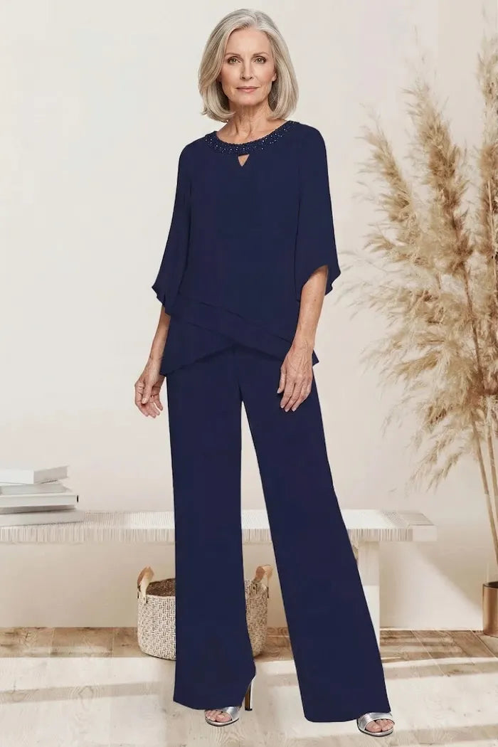 Sophisticated loose-fit formal pant set dress by THE WHITMORE FAMILY, featuring tailored design and elegant detailing.