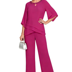 Fuchsia loose-fit formal pant set dress by THE WHITMORE FAMILY, featuring elegant tailoring and sophisticated style.
