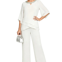 Sophisticated loose-fit ivory formal pant set by THE WHITMORE FAMILY, featuring a stylish dress and matching tailored pants.