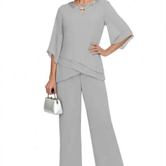 Sophisticated loose-fit formal pant set dress by THE WHITMORE FAMILY, featuring a silver, elegant Mother of the Bride pant suit.