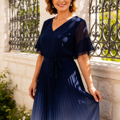 Dark navy tie waist chiffon midi dress with flutter sleeves from THE WHITMORE FAMILY, featuring a flowy silhouette and elegant design.