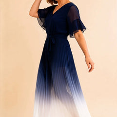 Dark navy tie waist chiffon midi dress by THE WHITMORE FAMILY featuring flutter sleeves and a flowing silhouette.