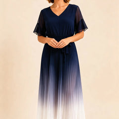 Dark navy tie waist chiffon midi dress with flutter sleeves by THE WHITMORE FAMILY, featuring a flowy, elegant design.