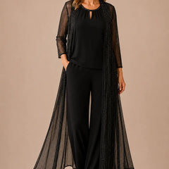 Sheer black duster formal pant suit by THE WHITMORE FAMILY, stylish mother-of-the-bride dress with elegant design and flowing silhouette.