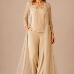 Sheer duster formal pant suit by THE WHITMORE FAMILY, elegant champagne-colored dress with flowing design and tailored fit.