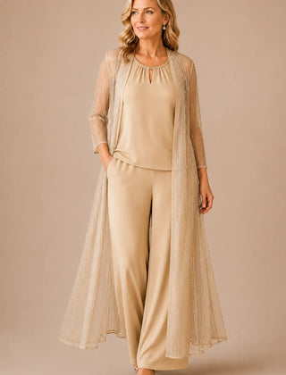 Sheer duster formal pant suit by THE WHITMORE FAMILY, elegant champagne-colored dress with flowing design and tailored fit.